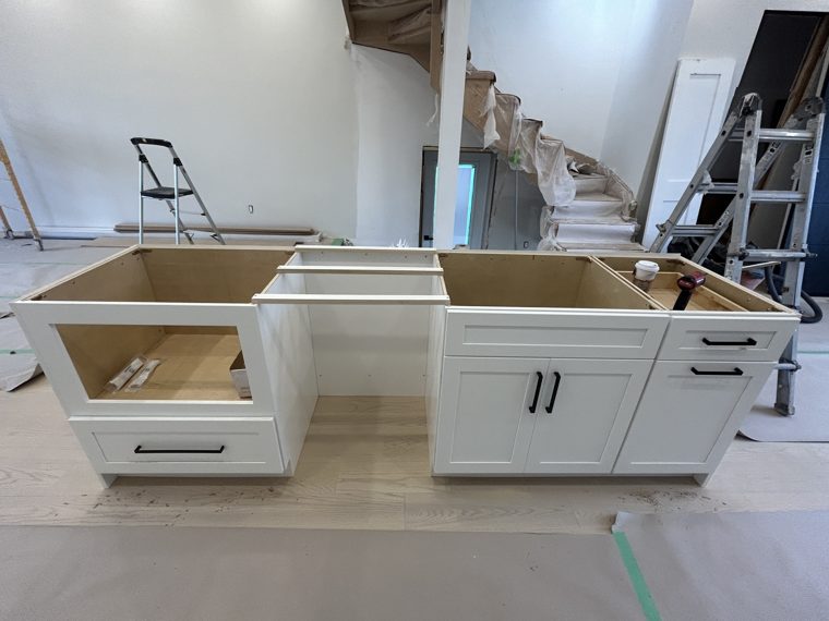 Island cabinet interiors before countertop installation
