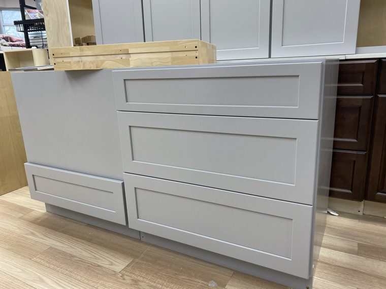 Grey drawer and sink cabinet fronts before fitting